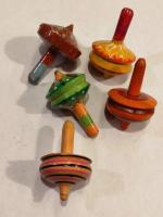 Set of five wooden tops